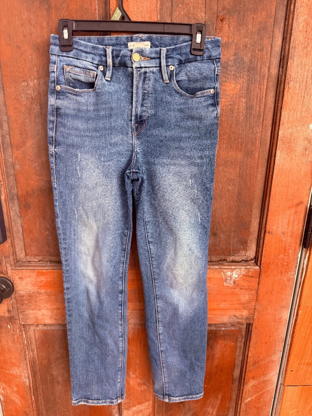Good American slightly distressed straight jeans. Petite length.
